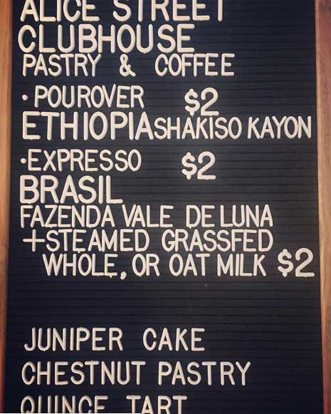Coffee drink and pastry menu board with prices